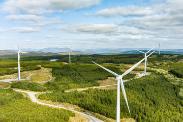 Connemara aerial landscape with wind turbines of Galway Wind Park located in Cloosh Valley, County Galway. Largest onshore wind farm in Ireland. Galway Wind Way recreation. - obrazy, fototapety, plakaty