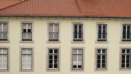 Fototapeta na wymiar building facade with windows and roof
