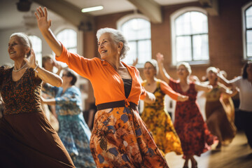 Fototapeta premium Senior women joyfully dancing together in a bright community hall
