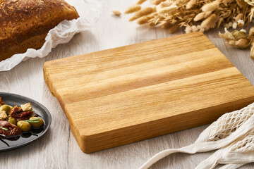 A wooden board is a place for cooking, a bright kitchen.