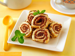 Mascarpone and red berries rolls.
