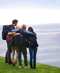 Friends, people hug with back and hiking on mountain, travel with view of horizon outdoor, ocean...