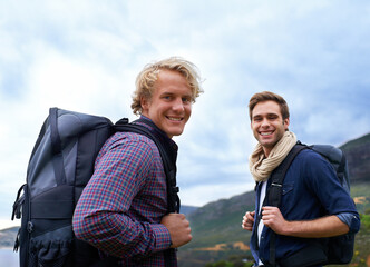 Happy man, portrait and friends with backpack for hiking mountain, travel or sightseeing on outdoor...