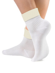 Side view of beautiful woman foot dressed in new nice and soft natural cotton fabric blank white socks