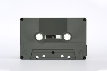 Front view of audio cassette standing isolated on white background