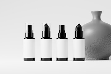 cosmetic branding mockup set featuring a spray bottle and a pump bottle.