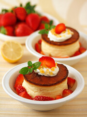 Cheese tart with lemon and strawberries.