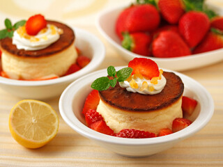 Cheese tart with lemon and strawberries.