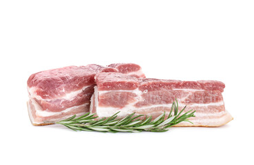 Pieces of raw pork belly and rosemary isolated on white