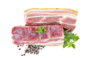 Pieces of raw pork belly, peppercorns and parsley isolated on white, top view