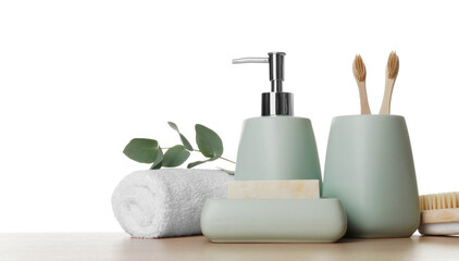 Bath accessories. Different personal care products and eucalyptus branch on wooden table against...