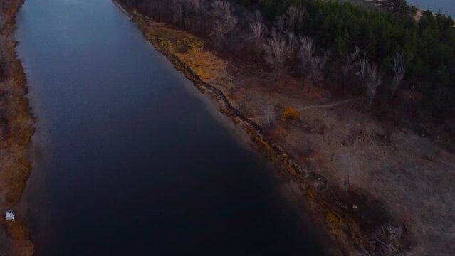 Autumn Tapestry Aerial Views of Russia Nature Drone Footage Over Volga River, Forest, and Mountains. Grushinsky Festival Meadow in Warm Glow