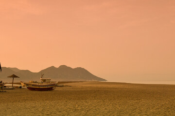 Twilight Calmness at Cabo de Gata Beach with Moored Fishing Boat