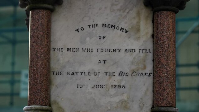 Tadhg An Asna O'Donovan marble inscription on statue in Clonakilty.