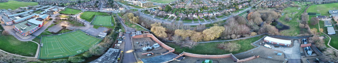Fototapeta na wymiar High Angle Panoramic view of East Luton City of England during Sunset. Luton, England UK. Feb 19th, 2024