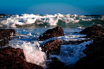 Waves crashing on rocks