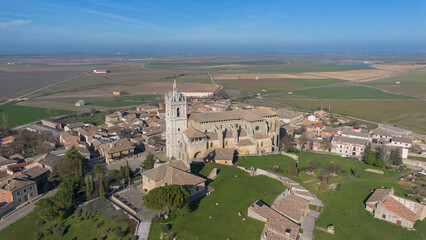 Fototapeta na wymiar Panoramic aerial view of the church of Tamara de Campos, Palencia, Spain