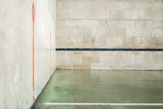 Empty urban handball court with red and black lines