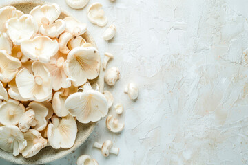 Fototapeta na wymiar Fresh champignon mushrooms on white.