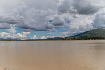 Lagoon with mountains in the background on a cloudy day, laguna Angostura in Cochabamba