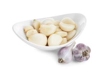 Fototapeta na wymiar Bulbs and cloves of garlic isolated on white