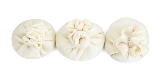 Uncooked khinkali (dumplings) isolated on white, top view. Georgian cuisine