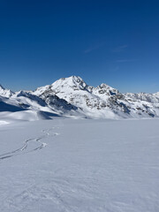 Fototapeta na wymiar Scenes backcountry skiing near Verbier, Switzerland, in the Alps with ski touring