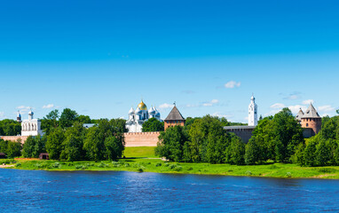 Fototapeta na wymiar Panorama of Veliky Novgorod Kremlin (Novgorod Detinets), Volkhov river in summer sunny day. Veliky Novgorod. Russia