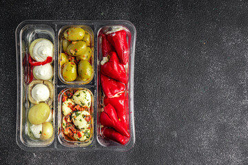 antipasti mix olives, mozzarella, stuffed peppers, mushrooms antipasto fresh food tasty eating appetizer meal food snack on the table copy space food background