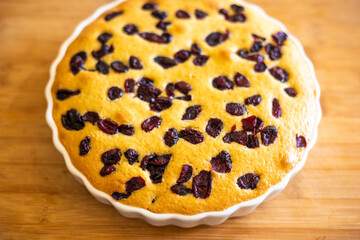 delicious pear and cranberry desserts close-up on wooden board 