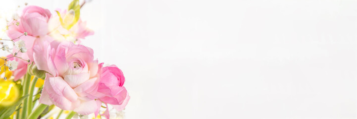 Ranunculus, willow, mimosa and gypsophila spring flowers bouquet