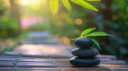 Foto auf Acrylglas zen stones on empty wooden with green leaf in the garden background blurred and . Concept relaxation, zen, spring. © buraratn