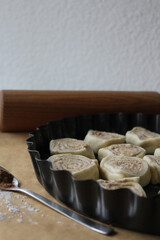 Preparing Raw Cinnamon Rolls