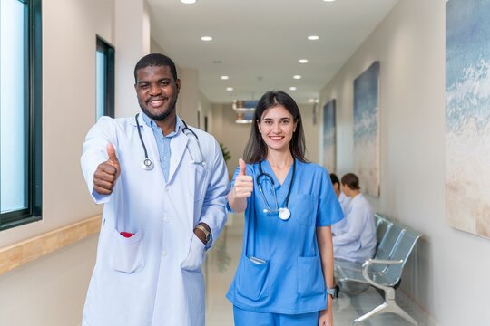 Thumbs up: Smiling Doctor and Nurse Radiate Compassion
