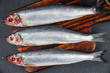 herring fish fresh seafood tasty eating cooking meal food snack on the table copy space food background rustic top view 