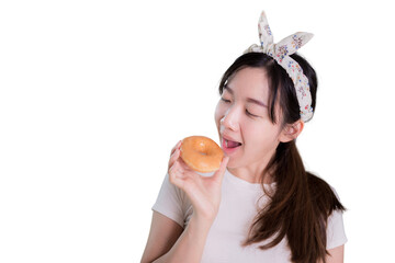 Smiling woman holding a sweet donut while a female happily eats a Sugar coated donuts. On Isolated...