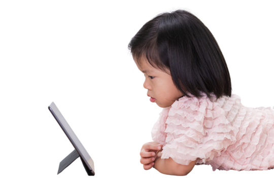 Asian child Girl reading on tablet at school. Preschool kid using a computer at home. Isolated on white background. Baby aged 4 years old.