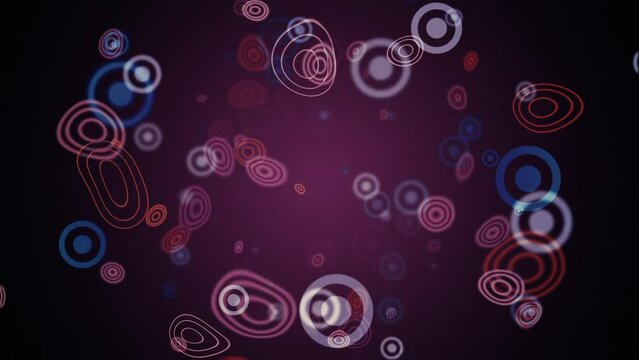Abstract bokeh particles background with multicolored concentric circles and ring squiggles. This trendy purple liquid motion effect background animation is full HD and a seamless loop.