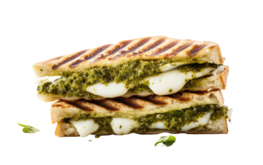 Grilled Sandwich With Pesto and Cheese. A grilled sandwich topped with flavorful pesto sauce and melted cheese, ready to be enjoyed. on White or PNG Transparent Background.