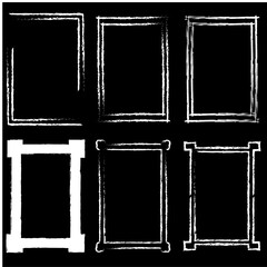 Grunge brush outline frames set. Hand drawn frame set. Rectangle pencil frames border shape elements. White rectangle vector illustration on black background.