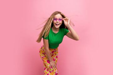 Photo portrait of lovely teen lady have fun touch sunglass excited posing wear trendy green garment...