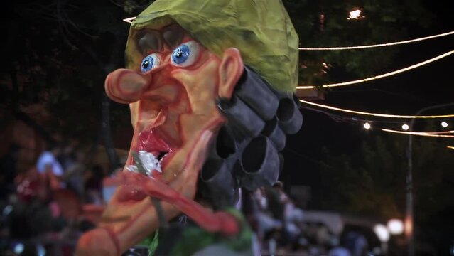 Giant Doll Called Cabezudo Dancing at the Artisanal Carnival of Lincoln, Buenos Aires Province, Argentina. 