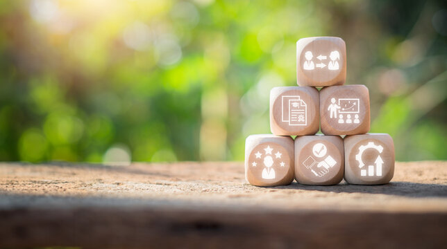 Onboarding concept, Wooden block on desk with onboarding icon on virtual screen.