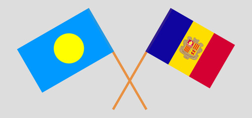 Crossed flags of Palau and Andorra. Official colors. Correct proportion