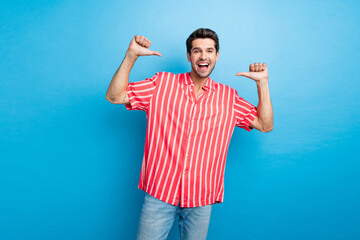 Photo of optimistic confident perky man with bristle dressed striped shirt indicating at himself...