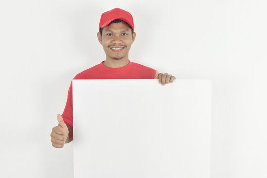 Delivery man holding blank paper with copy space, place for text image.