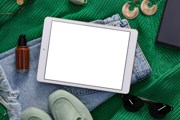 Flat lay composition with modern tablet on table. Space for text