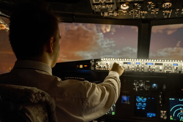 Skillful man captain navigates plane with finesse. Professional pilot turns cockpit in stage for...