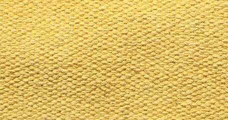 Fototapeta premium Texture of soft yellow fabric as background, top view