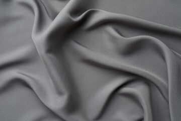 Fototapeta premium Texture of grey crumpled silk fabric as background, top view